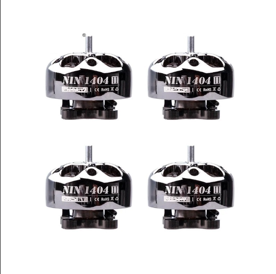 Four NIN1404 III motors on a white background