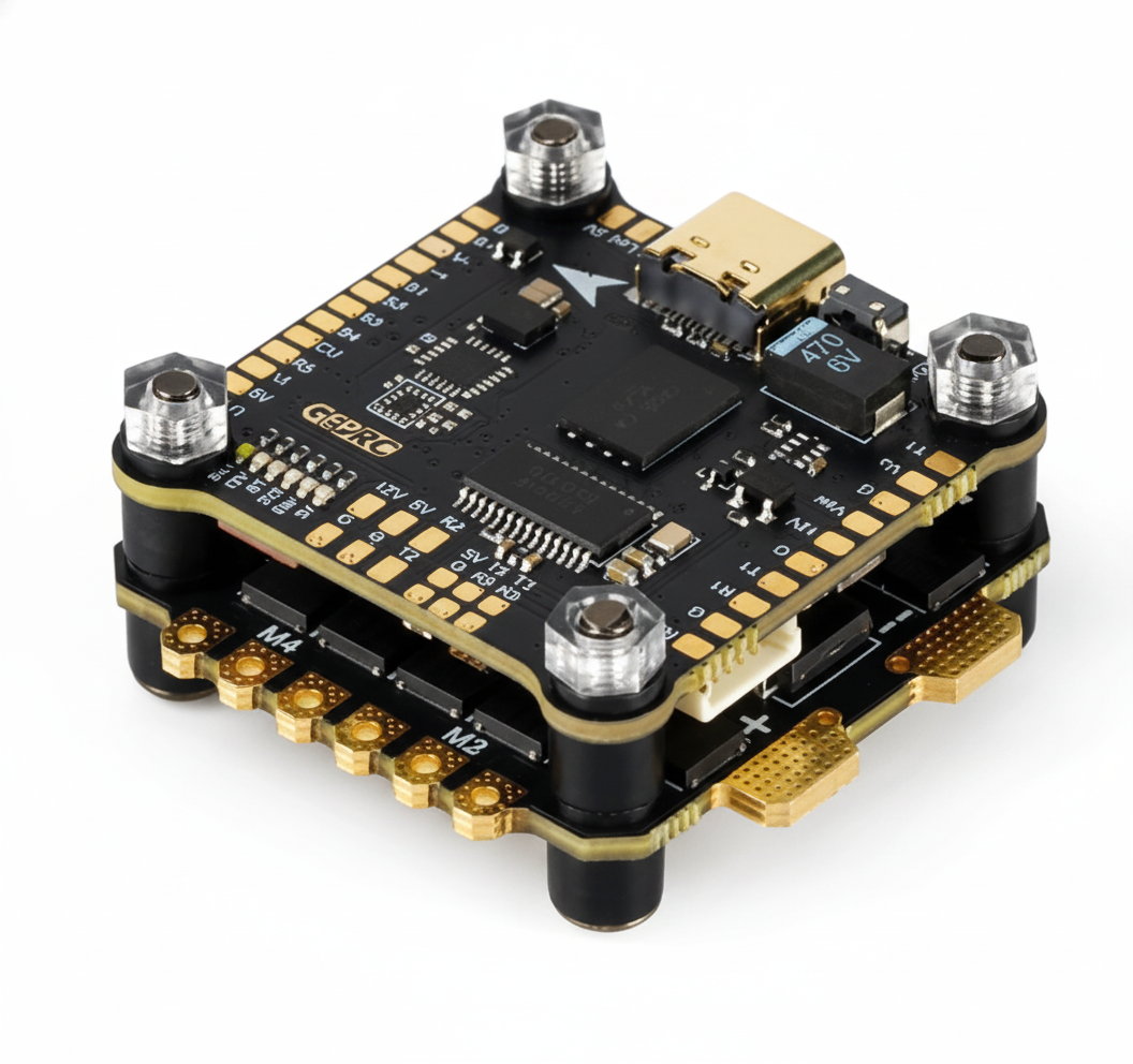 Electronic circuit board with gold and black components on a white background