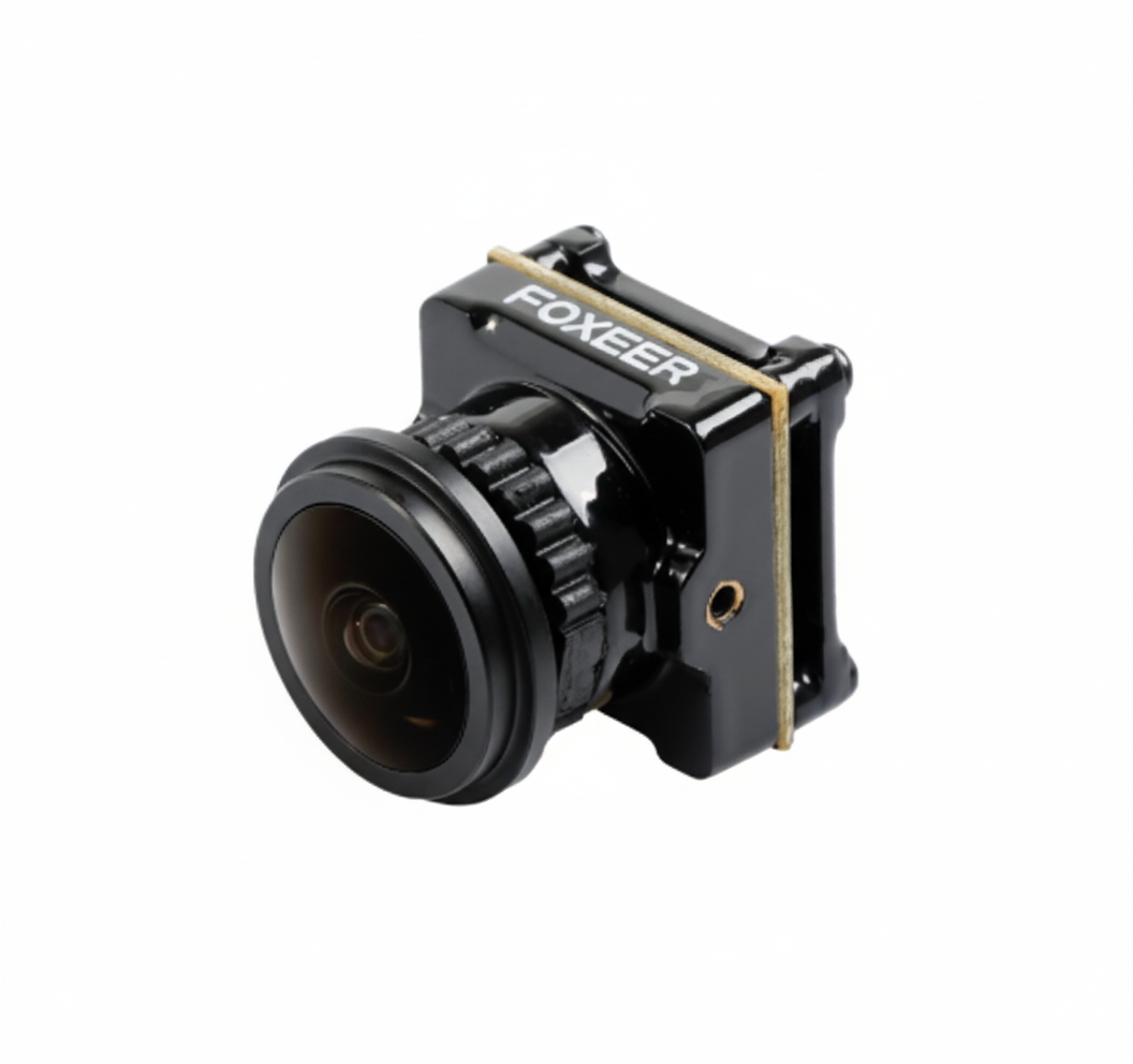Black camera lens with 'FOXEER' branding on a white background