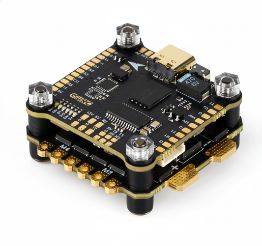 Electronic circuit board with gold and black components on a white background