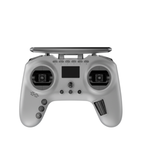 White remote control with black buttons on a white background