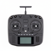 Black RadioMaster remote control with antennas on a white background