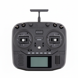 Black RadioMaster remote control with antennas on a white background