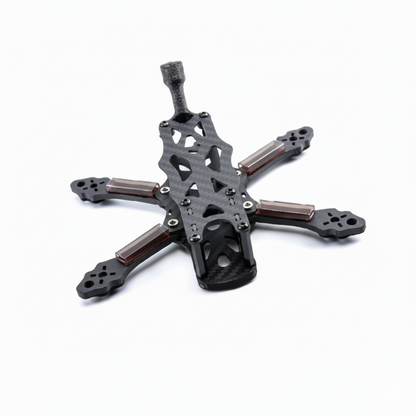 Compact 3-inch carbon fiber FPV drone frame with reinforced arms, central mounting area, and rear antenna mount for durable micro freestyle builds.